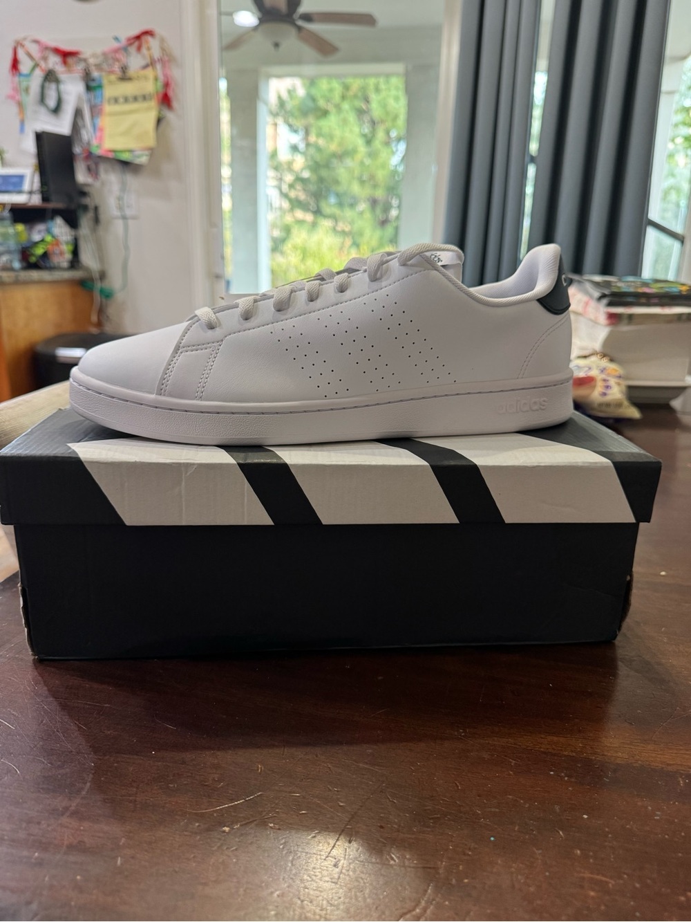 adidas Men’s White Leather Sneaker with Black Heel Patch